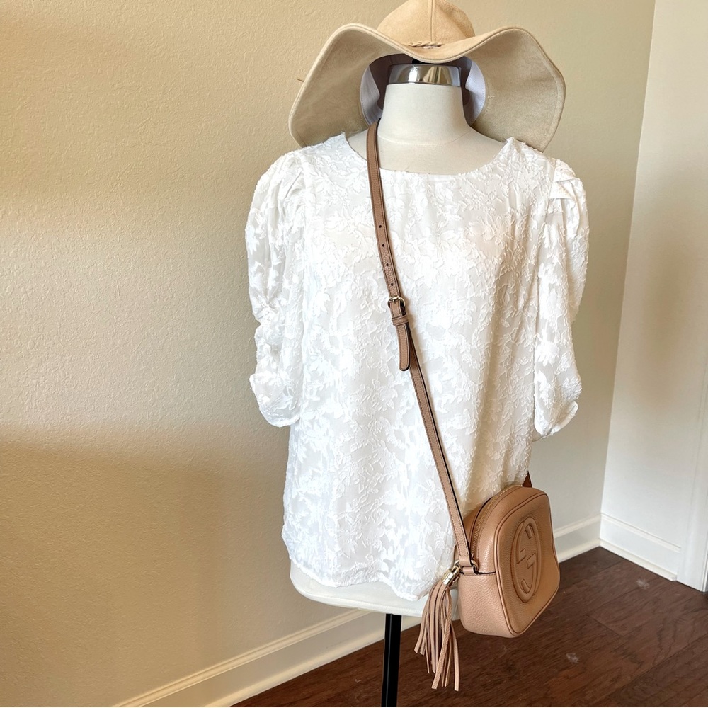 New with tags.  entro, white lace blouse, with lace sheer sleeves.  Size Large.